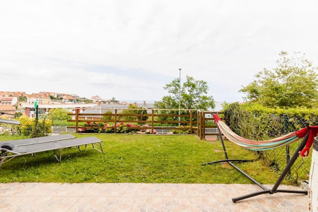 Casa De Las Flores - Apartamento Con Jardin Privado Frente A La Playa De โกมิญาส ภายนอก รูปภาพ