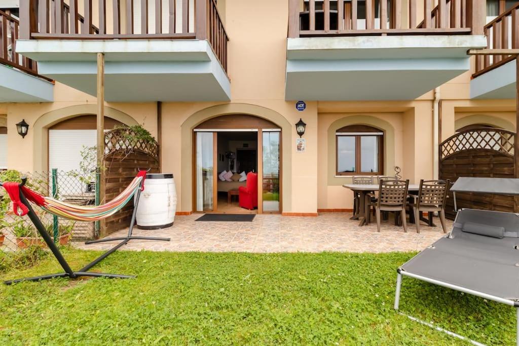 Casa De Las Flores - Apartamento Con Jardin Privado Frente A La Playa De โกมิญาส ภายนอก รูปภาพ