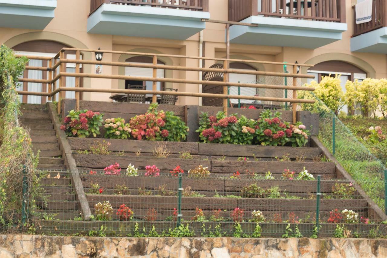Casa De Las Flores - Apartamento Con Jardin Privado Frente A La Playa De โกมิญาส ภายนอก รูปภาพ