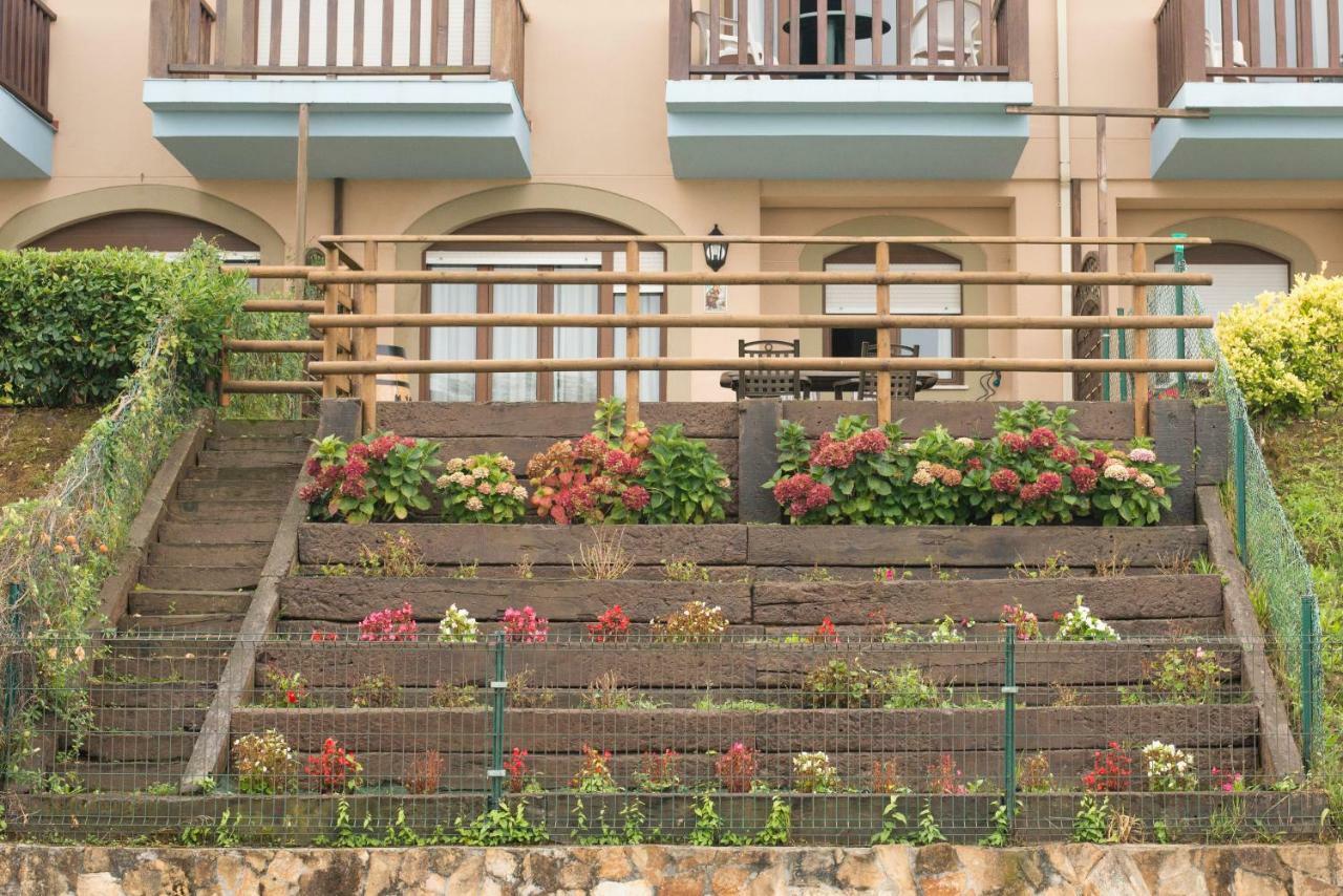 Casa De Las Flores - Apartamento Con Jardin Privado Frente A La Playa De โกมิญาส ภายนอก รูปภาพ