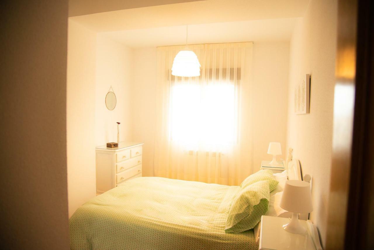 Casa De Las Flores - Apartamento Con Jardin Privado Frente A La Playa De โกมิญาส ภายนอก รูปภาพ